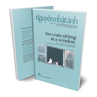 Two Cats Sitting At A Window